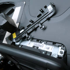 Hard-to-remove garnish behind audio head unit