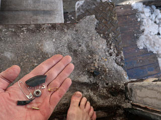 Ice, salt, and detritus underfoot in the truck
