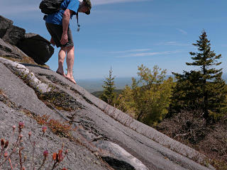 Sticking to a steep slab