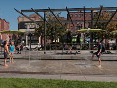 Playing with fountains at North End park