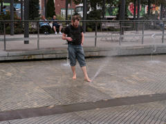 Playing in the Greenway fountains