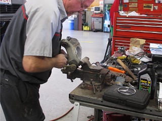 Dremeling out corrosion in knuckle