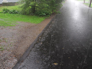 Driveway berm mostly holding