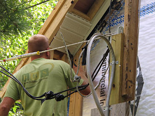 Working soffit near power pole