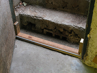 Threshold in place at basement door