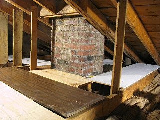 Temporary attic-floor around chimney