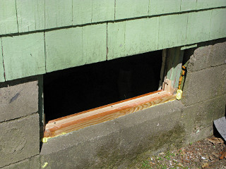 Rebuilt basement-window frame