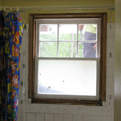 Bathroom window de-cased