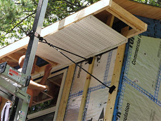 Applying soffit