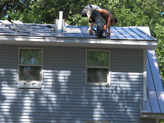 Clamping down pans on the shed