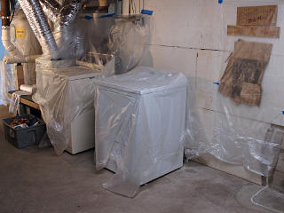 Basement items covered with plastic