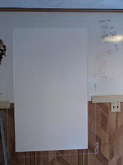 Kitchen ex-window filled with whiteboard
