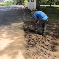 Hand-picking along berm