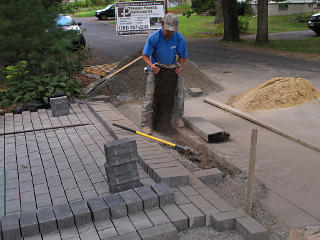 Pulling up asphalt chunks