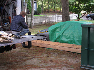 Tarping car against overspray