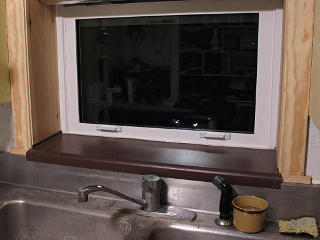 Kitchen window sill protected