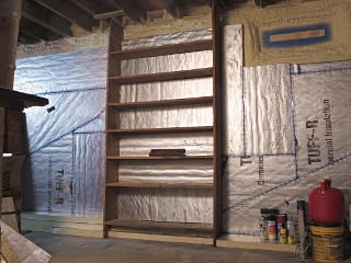 Insulation in between shelves