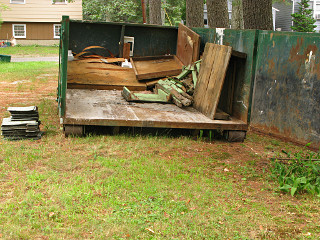 First junk load into dumpster