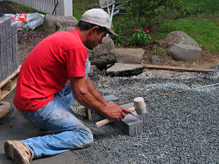 Laying first pavers