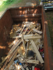 Scrap wood in the dumpster