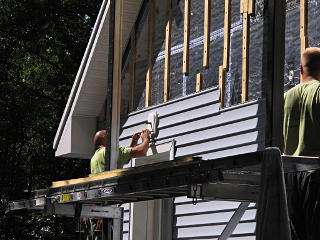 Siding over door