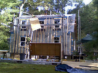 Handing ply up to shed roof