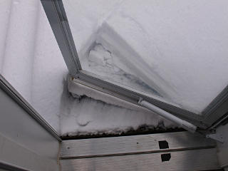 Snow over storm door level