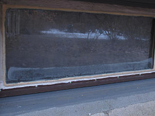 A little condensation inside basement sash