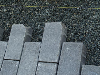 A couple of chipped pavers