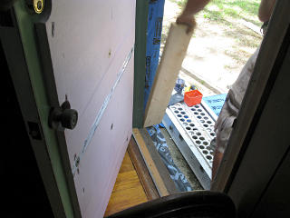 Reseating door back against floor