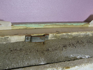 Weird green putty to build up the sill