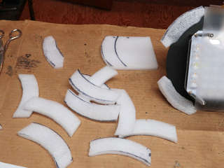 Foam 'ear covers' for mounting tabs