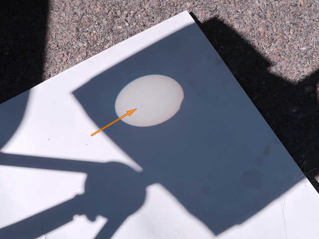 First contact! (and the quite visible sunspot)