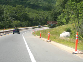 Traffic control bollards to prevent roadside parking