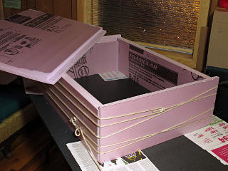 Sides glued and lashed together for curing