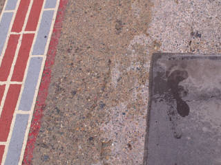 Bare footprints across the Charles River bridge