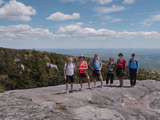 Whole group, lovely valley backdrop