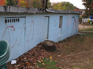 Back of storage building, where cables run