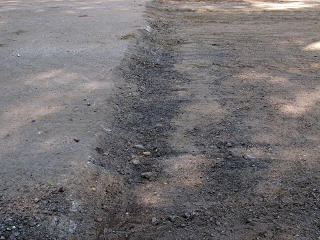 Dropoff at end of old pavement