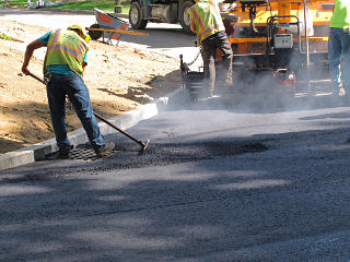 Paving up to curbs