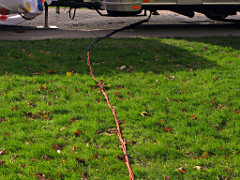 A trio of extension cords to bring 60A power into the RV