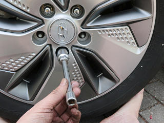 Old spark-plug socket spins lugnuts nicely