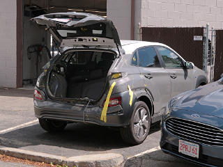 Partially stripped Kona at the body shop