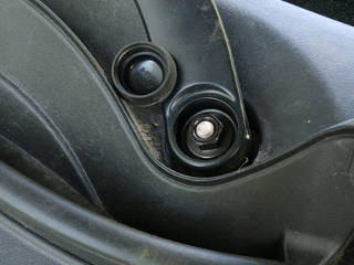 Rubber cap over wiper nut