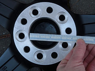 Modern Spare rim center bore, much bigger