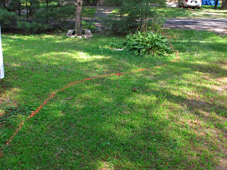 Hand-drawn curve toward the house