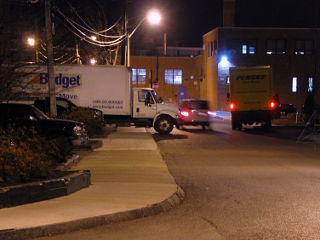 Trucks almost blocking the road