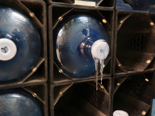 Icicle hanging off water bottle