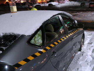 Weird cap of snow on the car