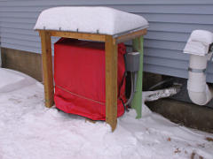 Condenser tarped for defrost operation